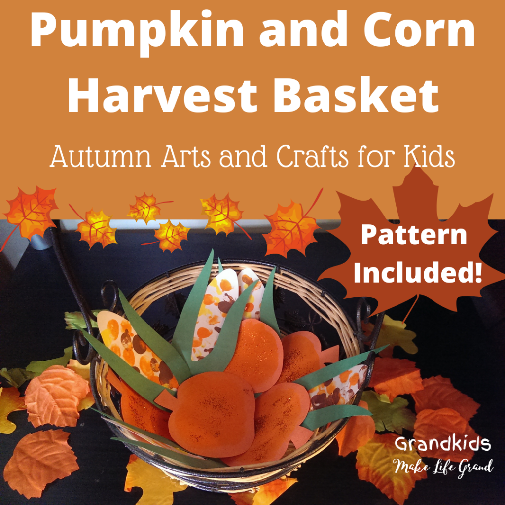 Paper pumpkin and corn put into a basket