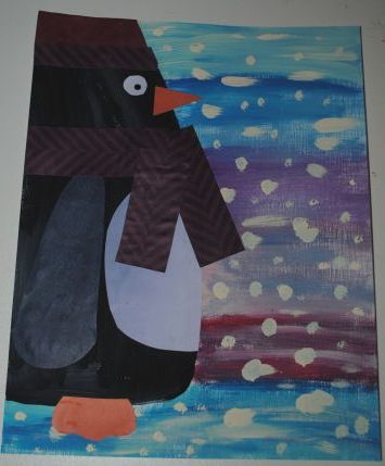 painting a beautiful penguin out in a winter scene