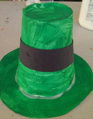 styrofoam cup and paper plate painted green and made into a leprechaun hat