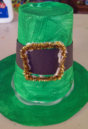 styrofoam cup and paper plate painted green and made into a leprechaun hat