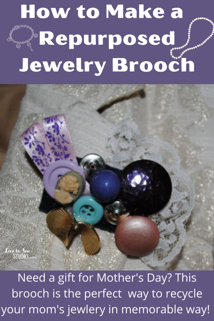 brooch made out of jewelry and buttons