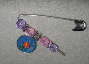 pin decorated with beads